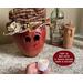 This is a fall gourd decoration is named Mac and has a lacy handmade hat. He comes with a battery-operated candle to light up his smile.